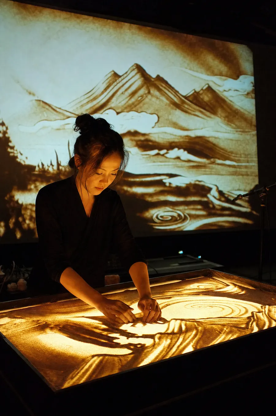 Sand animation on a backlit table
